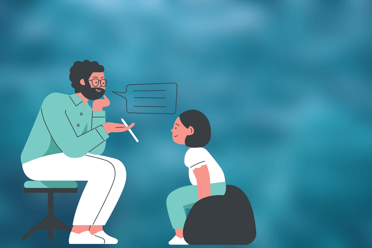 Psycholog rozmawiający z dzieckiem - grafika